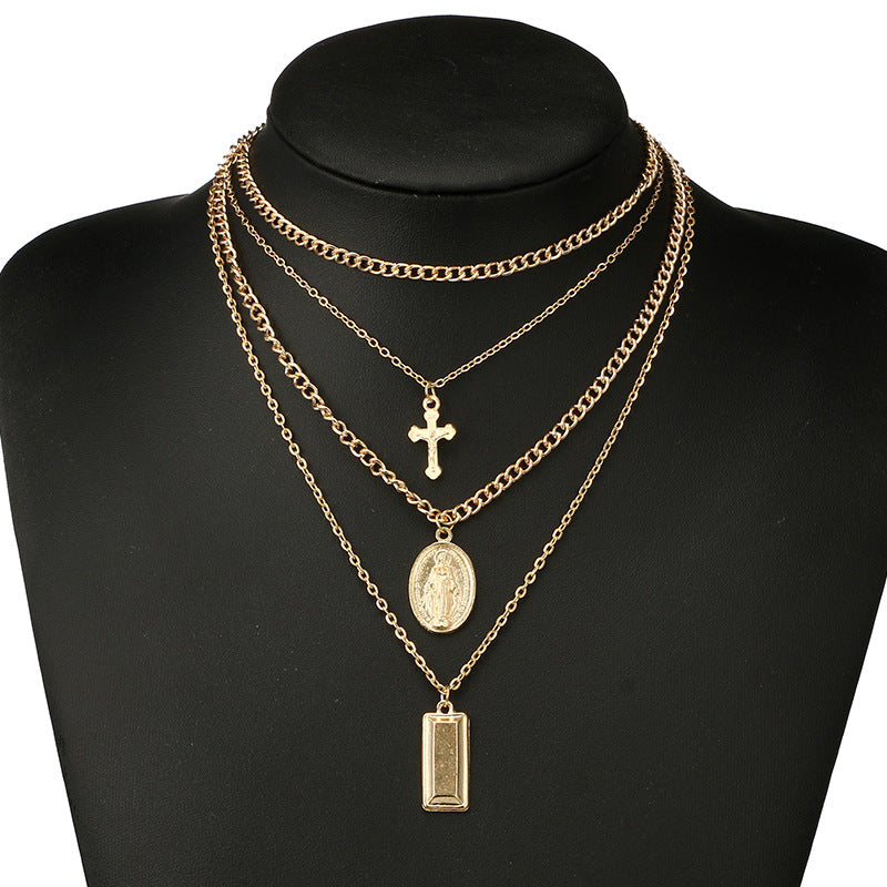 Multi-Layer Necklace with Cross and Virgin Mary Design