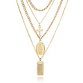 Multi-Layer Necklace with Cross and Virgin Mary Design